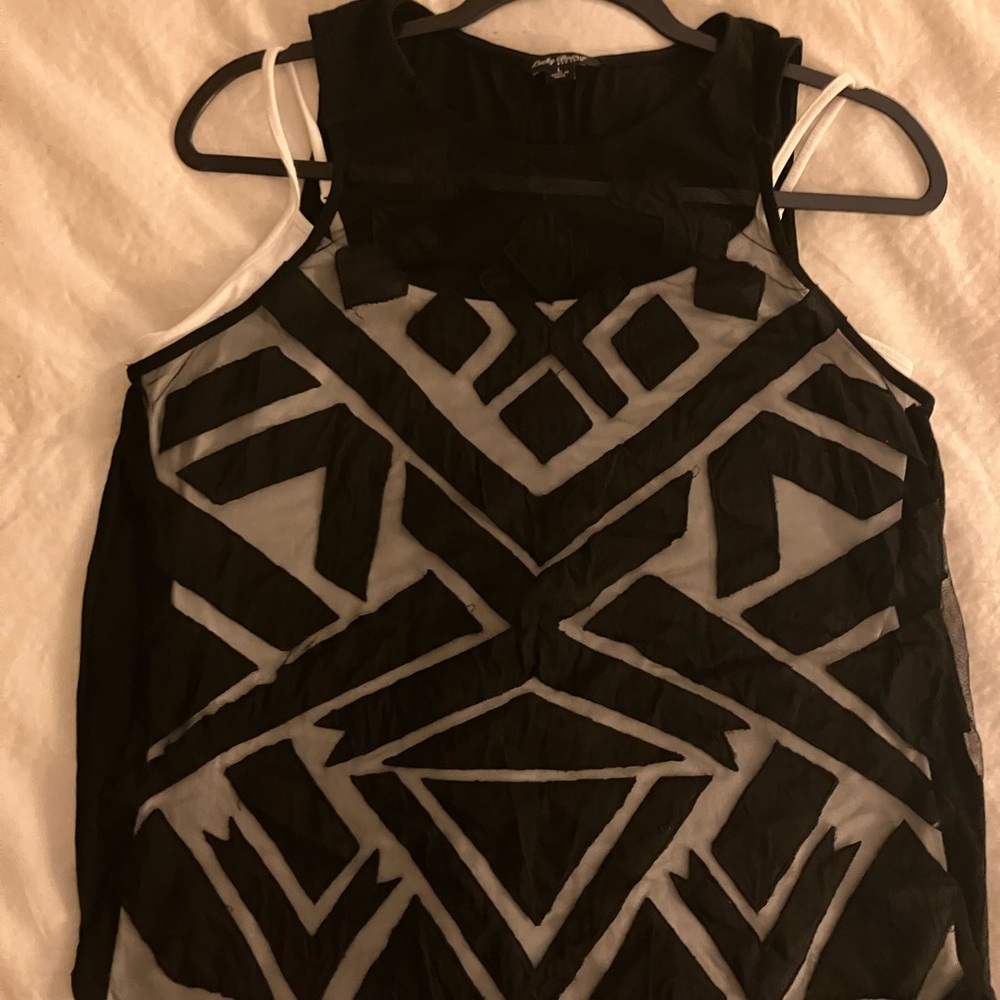 Sheer geometric tank top.